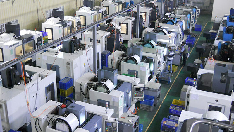 The CNC factory equipment is running at high speed.